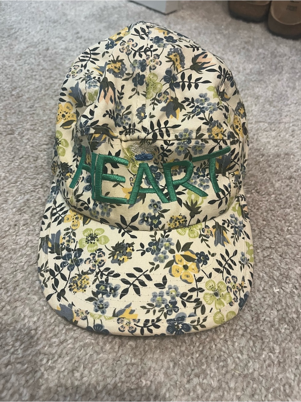 The Supreme Cap “Heart” Floral Cap in Cream with Green Embroidery OS